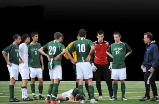 The varsity boys’ soccer team gathers around injured teammate John Richardson (‘11) after he takes a hit in the Vikings 1-0 victory against the Gunn Titans on Jan. 12, 2010.