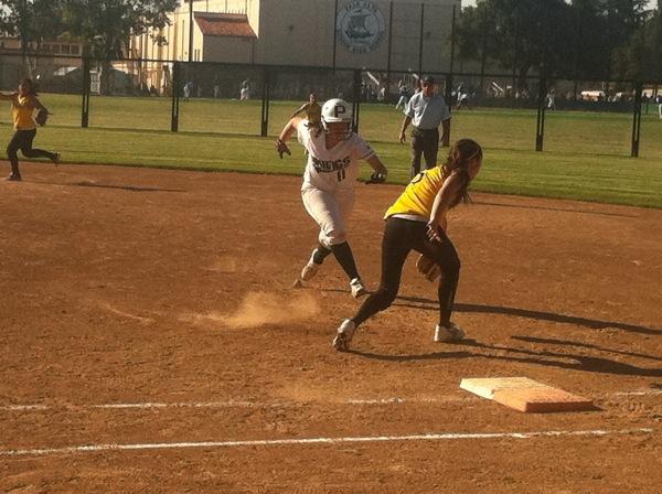 First baseman Mariah Philips (11) tags up at first in a 4-6 loss against Wilcox. Philips had two singles in the game.