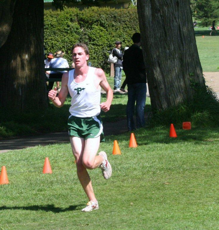 Nikolai Solgaard (12) pushes towards the finish during the Lowell Invitational on Saturday, September 17.  Solgaard finished with a time of 15:35, leading the way for Paly.