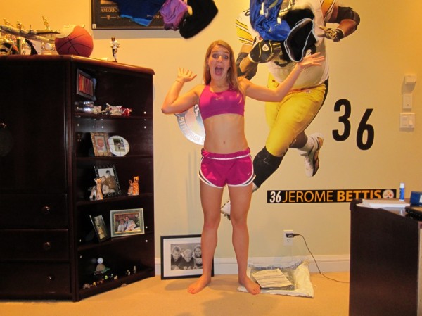 Columnist Shannon Scheel (12) cannot get enough of those Nike products. In her enthusiasm she has caused half of her collection to go airborne. Wheres the pink sports bra? She went on a run today, so its in the wash, of course!