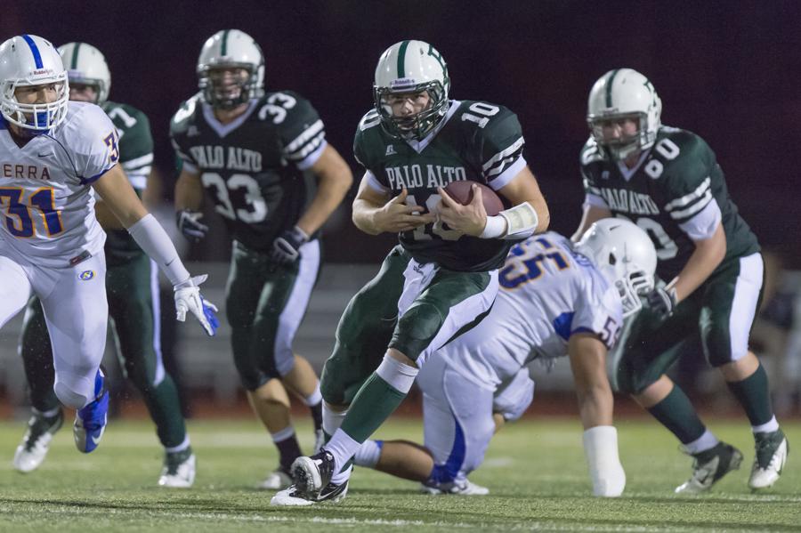 Keller Chryst (‘14) rushes the ball during the Paly vs Serra football game. The Vikings lost to the Padres 52-35 in the first round of the Central Coast Section Open Division Playoffs.
