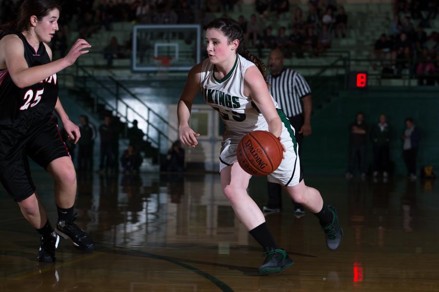 Annie Susco (13) dribbles the ball during Palys game against Gunn. The Lady Vikes lost 40-34 to Lynbrook High School, dropping their record to (8-11) overall and (4-4) in SCVAL league play.