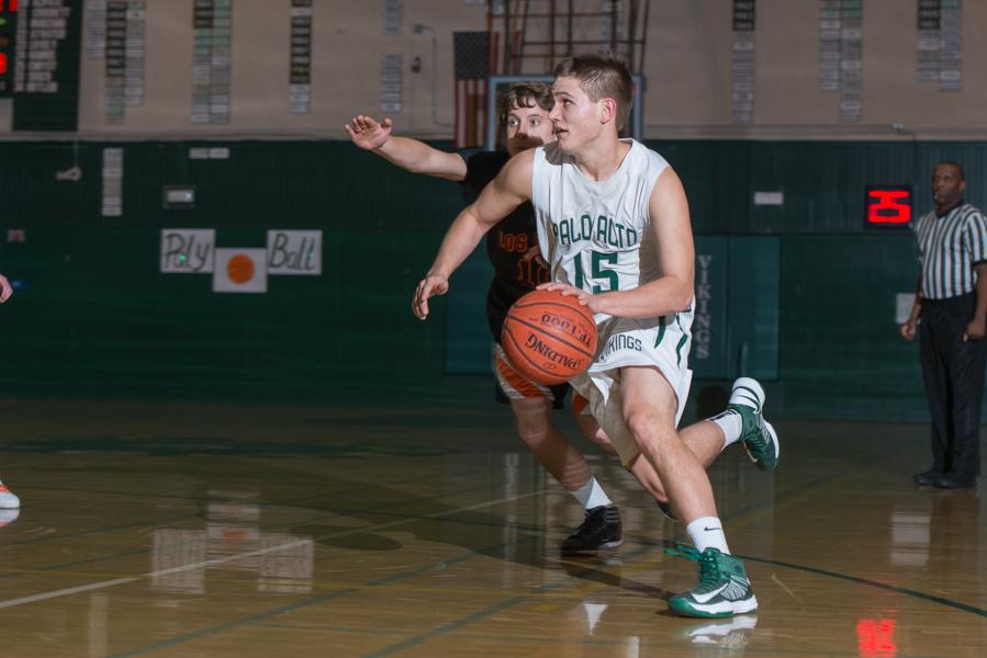 Mathias Schmutz (13) drives by a defender during Palys victory over Los Gatos on Feb. 8. Paly will play Riordan in the first round of CCS this Friday.