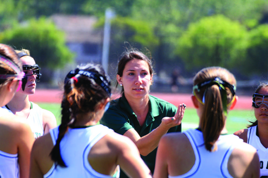 Jamie Nesbitt, nominated Vikings 2013 coach of the year, gives her players advice in the league title championship.