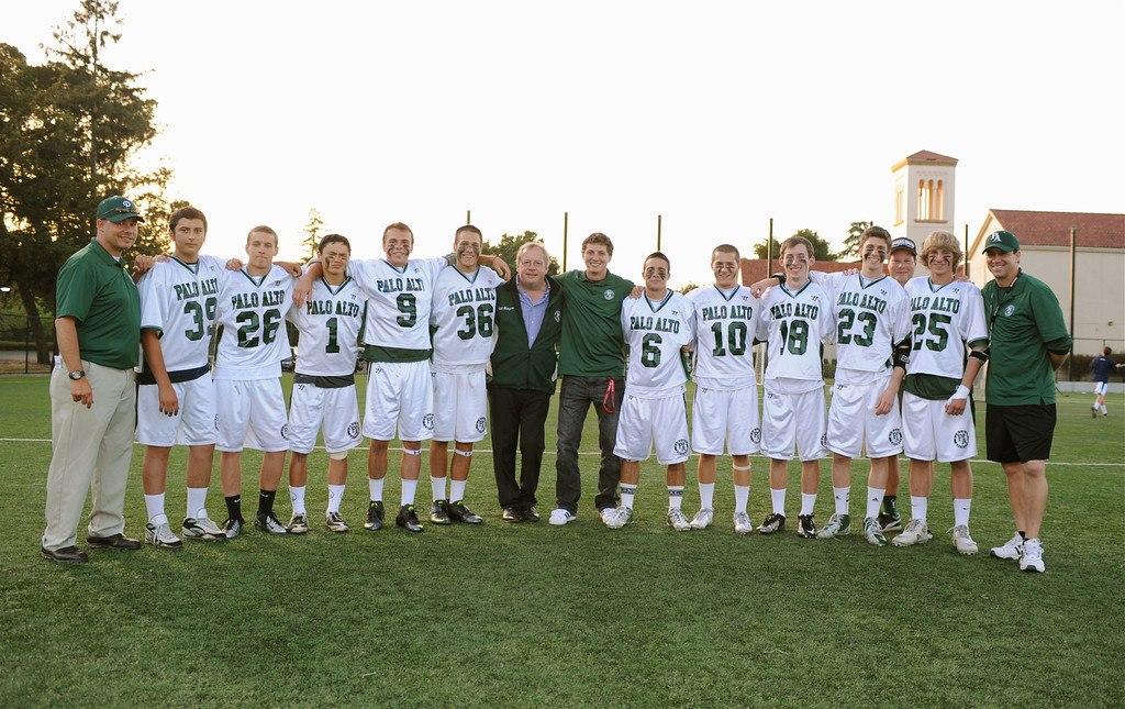 Conover (far right) with his seniors last spring. After five years with the team, he has parted ways with Paly lacrosse. 