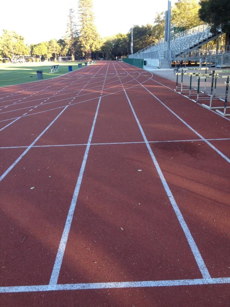 One+of+the+straightaways+on+the+Paly+track+sits+unused+late+in+the+day.+During+the+summer%2C+workers+resurfaced+the+track+and+finished+jump+pits%2C+completing+the+football+stadium+remodel.