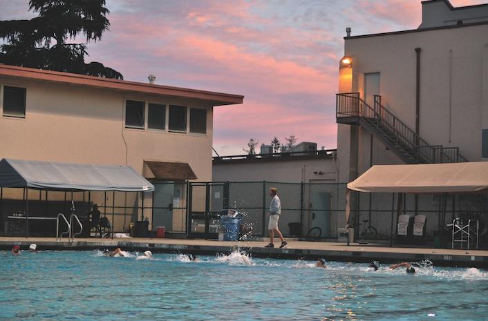 The girls' water polo team swims at their regular season morning practice. They had 5:30 a.m. practices during hell week.