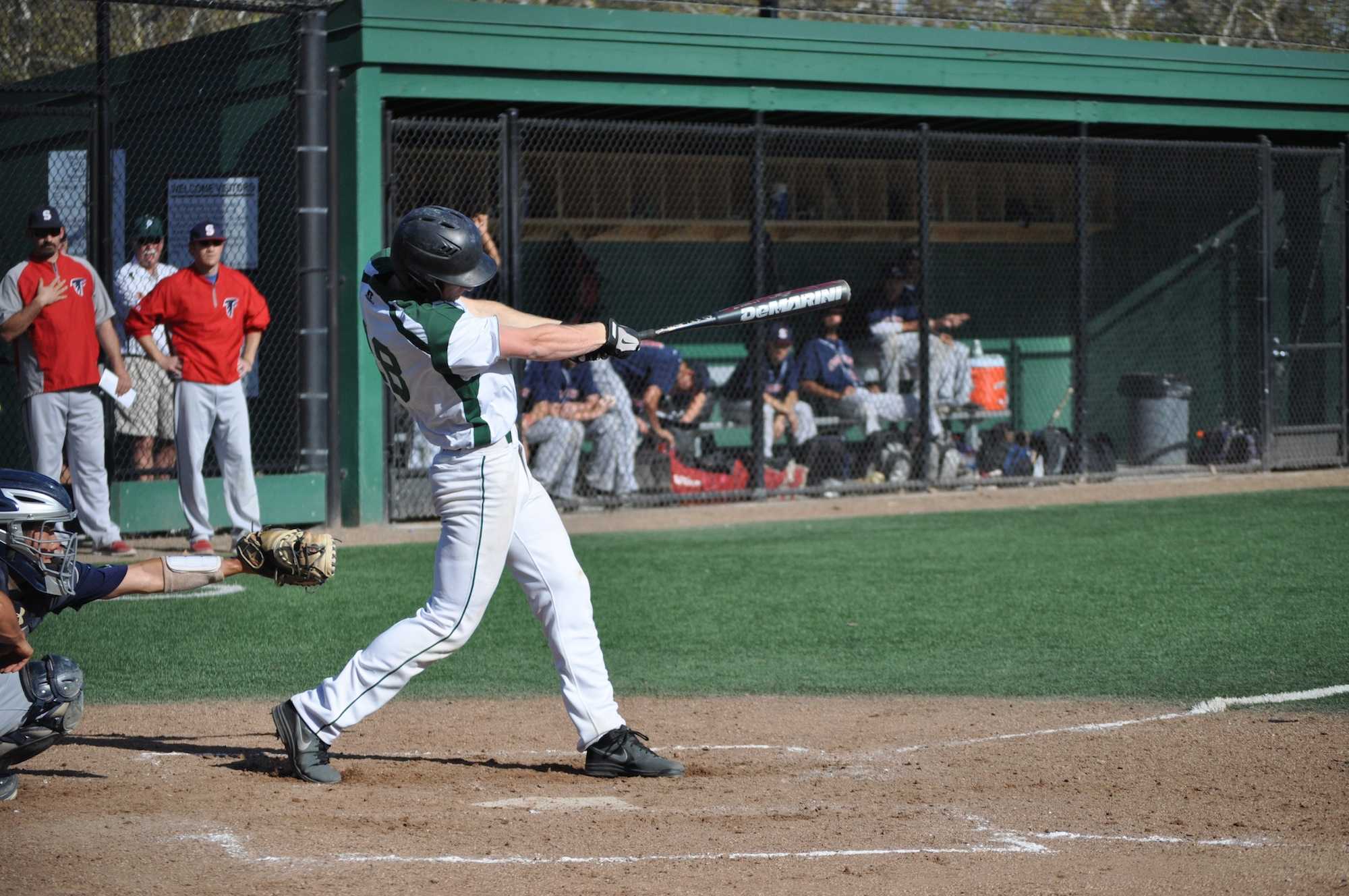 Bowen+Gerould+%2814%29+hacks+at+a+fastball+in+his+first+at+bat.+Gerould+had+2+hits+against+Saratoga.