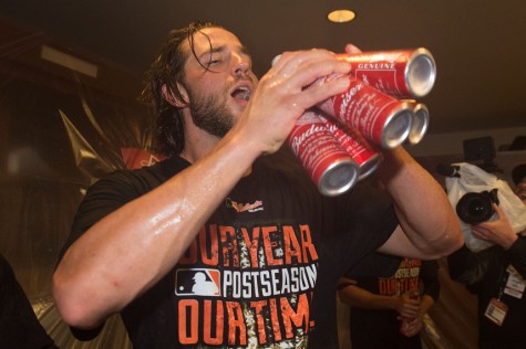Madison Bumgarner celebrates a series win with a drink, or five.