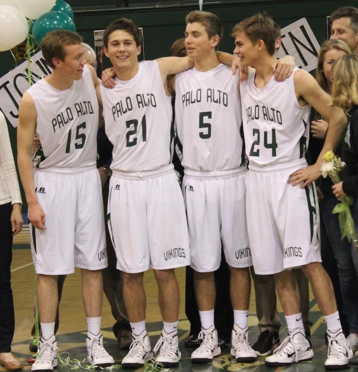 The four seniors Corey Bicknell (15), Kevin Mullin (15), Jonny Rojahn (15) and Alex Dees (15) smile big on senior night as they prepare to to play in their last season home game ever. 