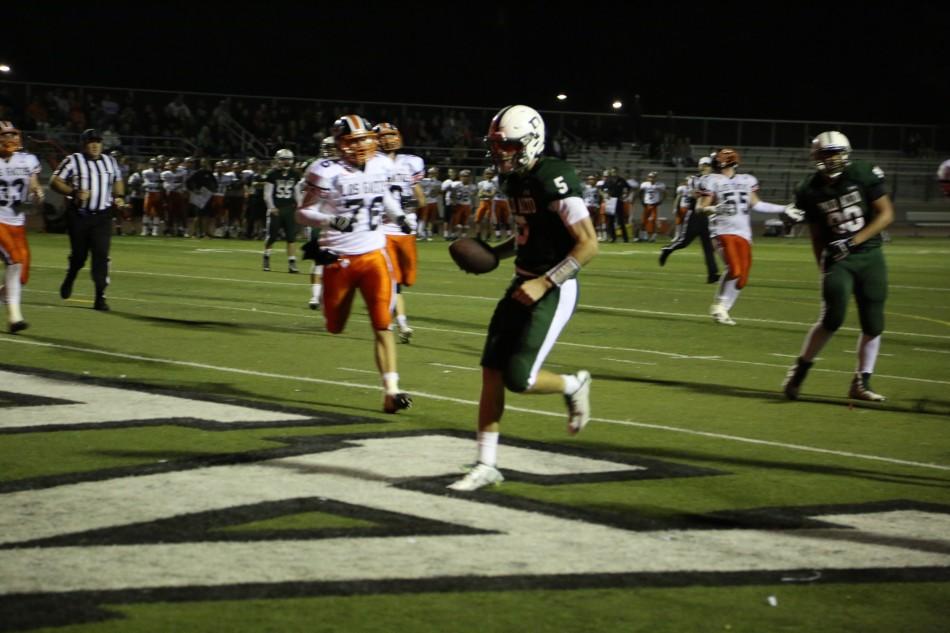 Justin Hull (16) enters the end zone for a touchdown. 