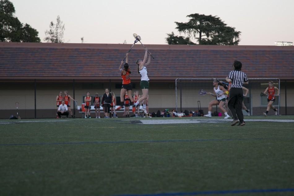 Emma Staiger (18) wins the draw for the vikings in its 16-8 victory over Los Gatos
