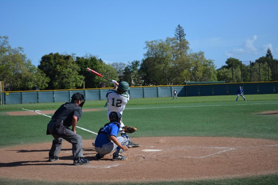 Alec Olmstead (16) takes a swing in todays matchup against Los Altos High School. 