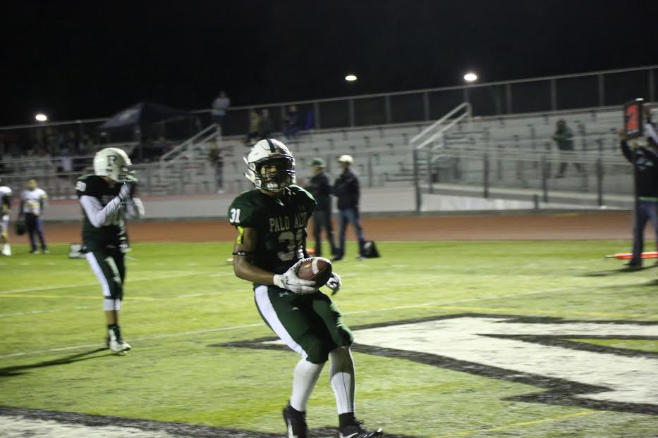 Paul Jackson III (18) stops in the enzone after scoring a touchdown for the Vikings. Jackson III had 3 touchdowns in this game against Wilcox.