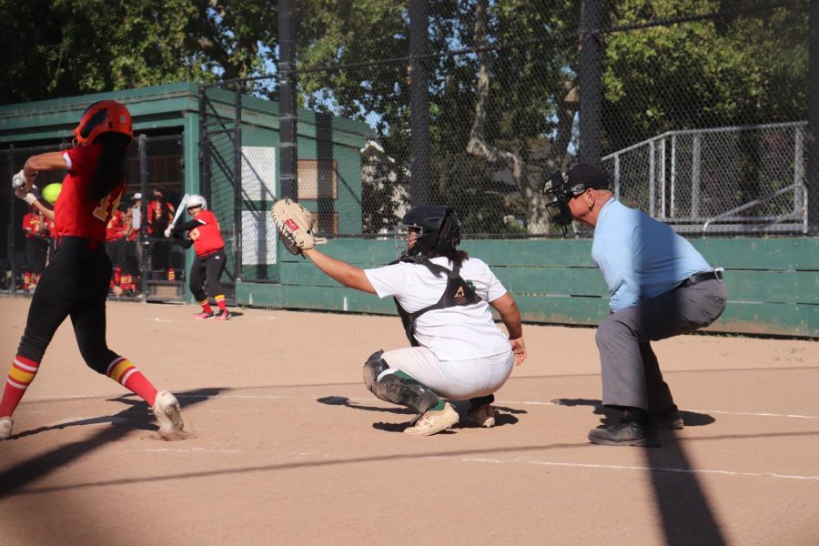 Hana Foster (24) catches a pitch. Photo by Grace Gormley. 
