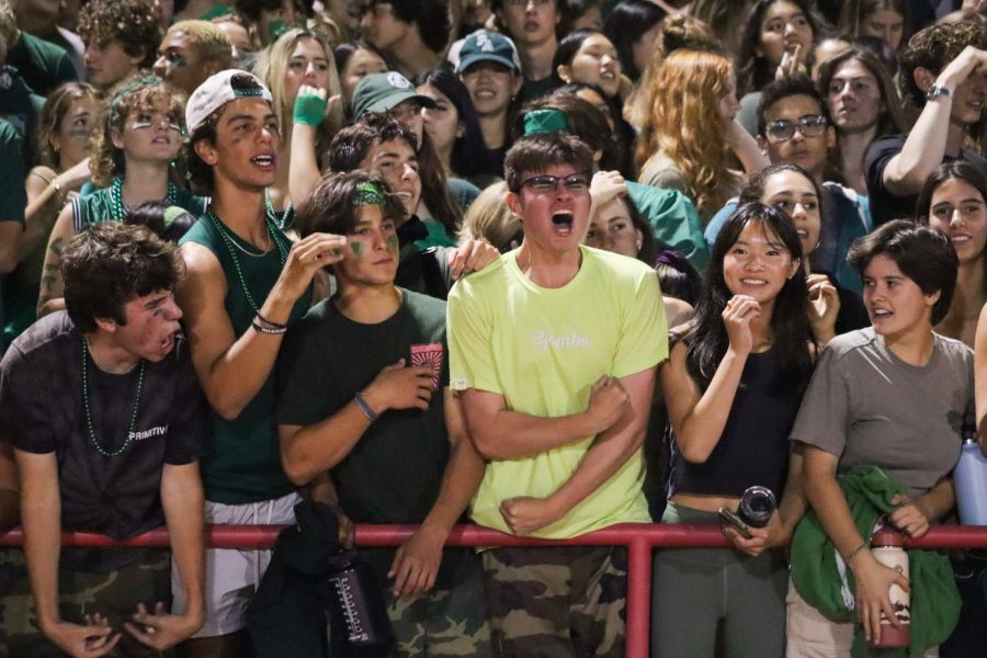 Paly fans cheer at a football game. Powderpuff would be played in the same fun atmosphere, but would showcase skilled female athletes and a fun, fast paced game. 