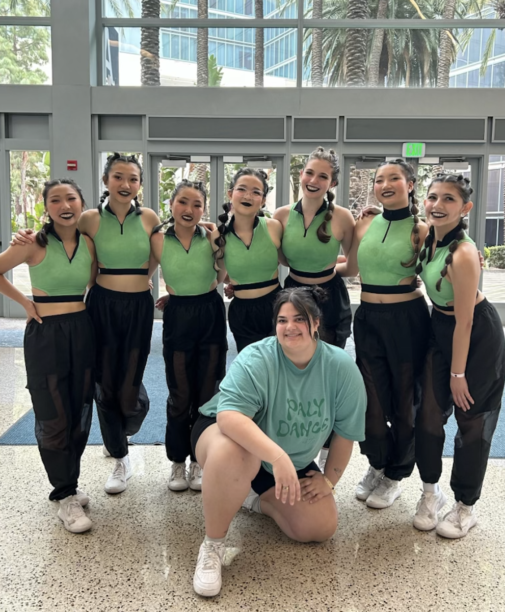 The Paly dance team, along with coach Alana Williamson in front, pose for a photo at the National Tournament. Photo courtesy of Rachel Ho. 