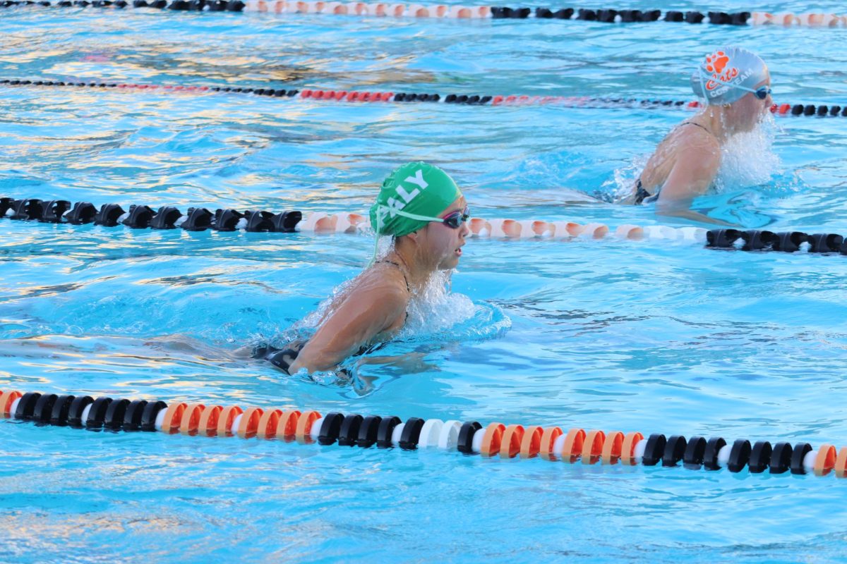 Freshman Hannah Oh swims breaststroke. Photo by Grace Gormley. 