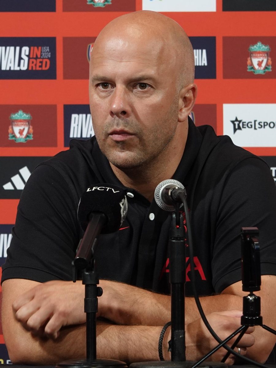 Liverpool manager Arne Slot during a press conference. 
Photo use permitted by Wikimedia user NullReason, findable here: https://commons.wikimedia.org/wiki/File:Liverpool_Manager_Arne_Slot.jpg