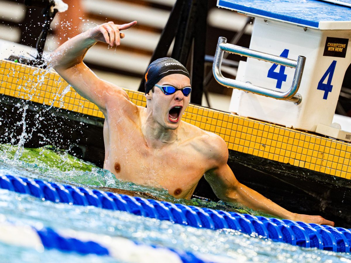 Texas' Hubi Kos after setting a new NCAA Record in the 100 yard backstroke with a 42.61